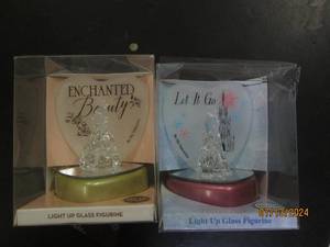 2 light up figurines...