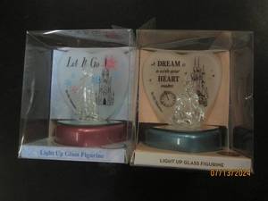 2 light up figurines...