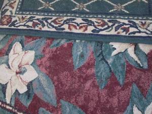 Large round rug and small rectangular rug, used and need cleaning.