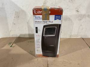 lot 107 image: Lasko Oscillating 1500W Electric Motion Heat with Remote Control, CC23161, Black