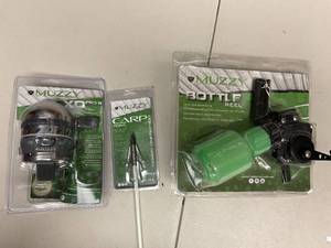 lot 388 image: Muzzy Bowfishing Drag Free Bottle Reel, MUZZY CARP POINT COMPLETE ARROW, Muzzy Pro Bowfishing Reel Silver