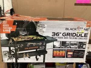 lot 568 image: Blackstone Adventure Ready 4-Burner 36 Propane Griddle with Omnivore Griddle Plate and Hood