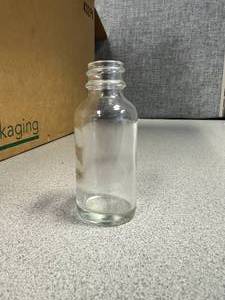 lot 10 image: Box of 432 Express Glass 1oz Bottles  Jars