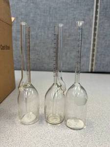 lot 20 image: 27 - Assorted USED Bascock Bottles