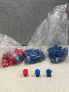 lot 9 image: Bags of Stoppers, 1 Hole 2 Hole and Solid, 1 Inch Top