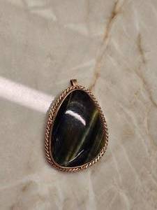 lot 8 image: Blue Tiger Eye Gold Pendent (marked 90)