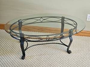 lot 24 image: Provincial Scrolled Iron Oval Cocktail Table