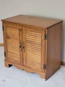 lot 56 image: Vintage Slatted Door Accent Cabinet