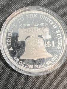 � TROY OZ .999 FINE SILVER COOK ISLAND ROUND IN AIRTITE