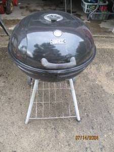 lot 5 image: Backyard charcoal Grill...