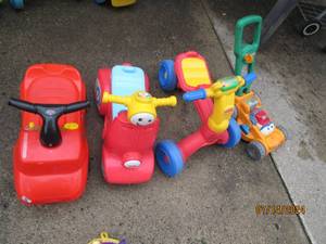 lot 12 image: (3) Fisher Price toddler size foot ...