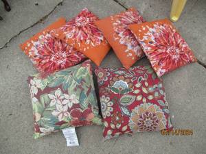 lot 22 image: Pile of pretty floral accent pillow...
