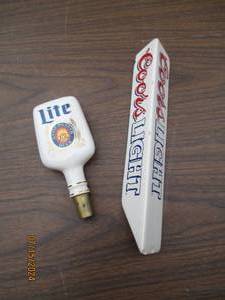 lot 70 image: Coors Light and Miller Lite bar tap...