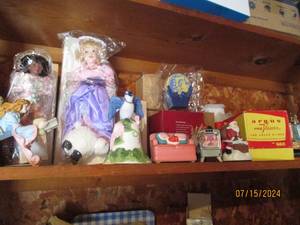 lot 130 image: Avon dolls, nik naks, pirate ship a...