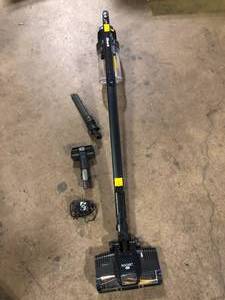lot 26 image: Shark Pet Pro Bagless Cordless Washable Filter Stick Vacuum for Multisurface, Carpet & HardwoodWood Laminate Surfaces in Blue Customer Returns See Pictures