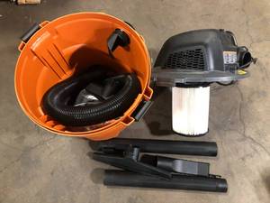lot 28 image: RIDGID 12 Gallon 5.0 Peak HP NXT WetDry Shop Vacuum with Filter, Locking Hose and Accessories  Customer Returns See Pictures