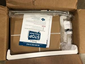 lot 29 image: Complete 22.875 in. x 23.5 in. White Utility Sink Set with Metal Hybrid Stainless Steel High Rise Faucet & Side Sprayer Customer Returns See Pictures