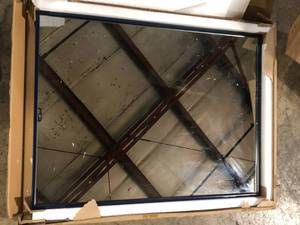lot 37 image: Timeless Home 24 in. W x 32 in. H Midcentury Modern Metal Framed Rectangle Blue Mirror  Customer Returns See Pictures