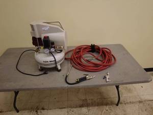 lot 24 image: Tool Shop 2HP 4-Gallon Pancake Air Compressor with Accessories
