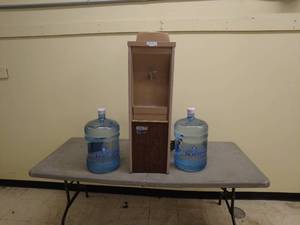 lot 44 image: Oasis Water Dispenser with Two Water Jugs