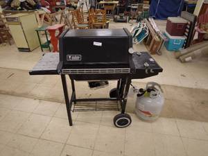 lot 60 image: Weber Gas Grill with Propane Tank