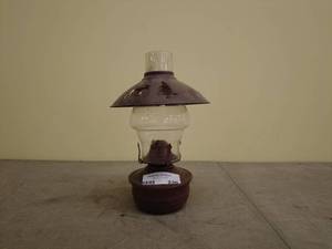 lot 236 image: Rustic Oil Lamp with Woodland Cutout Design