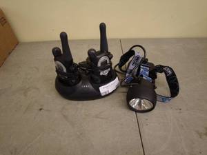 lot 203 image: Motorola Two-Way Radios with Charger and Petzl Headlamp
