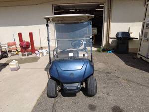 lot 2 image: 2021 Yamaha Electric Golf Cart with Cooler, charger & Fresh Batts
