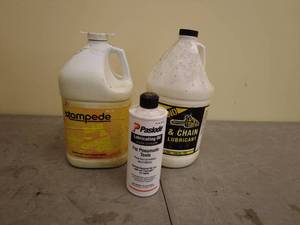 lot 284 image: Lot of Lubricants Bar and Chain Oil, Chain Lube, Pneumatic Lubricant