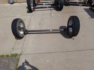 lot 3 image: Lippert Trailer Axle with ST 20575R15 Rainier Tires. 3500# capacity