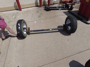 lot 302 image: Lippert Axle with 2 Tires ST20575R15 -Rainier ST 3500# capacity