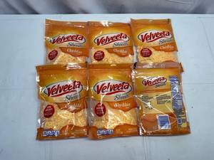 lot 437 image: G. 6x 8oz Velveeta Shreds-Cheddar Flavor