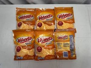 lot 438 image: G. 6x 8oz Velveeta Shreds-Cheddar Flavor