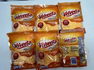 lot 440 image: G. 6x 8oz Velveeta Shreds-Cheddar Flavor