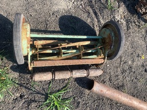 Post pounder and reel mower