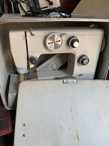 2 record players, 8mm projector, sewing machine