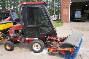 lot 84 image: Toro Groundsmaster 328-D Commercial Tractor with Sweeper and Salt Spreader