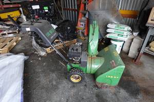 lot 106 image: John Deere TRS 24 Gas Snow Thrower