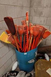 Bin Full of Broom Ball Sticks