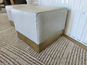 lot 9 image: Lee Industries Cream Leather Footstools with Brushed Bronze Banding
