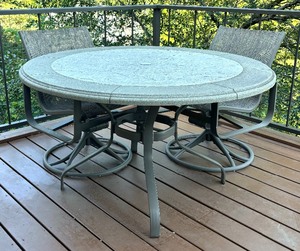 lot 5 image: Tropitone Table with Four Rocker Chairs
