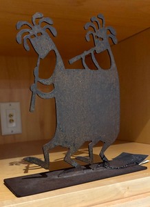 lot 88 image: Flute Playing Kokopeli Fellas Metal Decor by Pozzi Franzetti