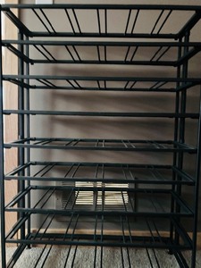 lot 44 image: Unique Black Metal Two Piece Wine Rack