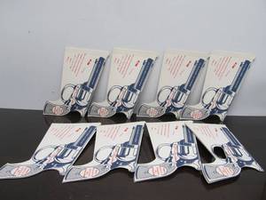 lot 15 image: Very Cool Vintage Gun Shaped Jim Shoulders Six-Shooter Rodeo Advertisement - Lot of 8