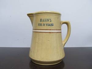 lot 47 image: Old Vintage RED WING Stoneware Advertising Pitcher - Hahns