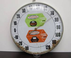 lot 75 image: Vintage 1960s era TRAMISOL Farm Advertising Thermometer 