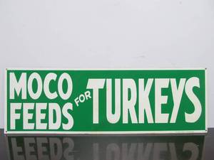 lot 104 image: Vintage Metal MOCO Feeds for Turkeys Farm Advertising Sign