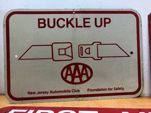 lot 205 image: Lot of 4 Assorted Vintage Metal Signs - Gas Pump Buckle Up & First Aid