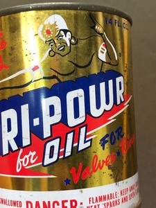 lot 129 image: Vintage DRI-POWR Metal Advertising Oil Can wGenie Graphics