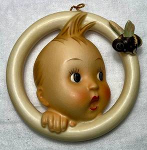 lot 25 image: MJ Hummel Baby Boy and Bee Wall Plaque 300A Western Germany